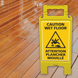 Chevalet de signalisation jaune attention plancher mouillé